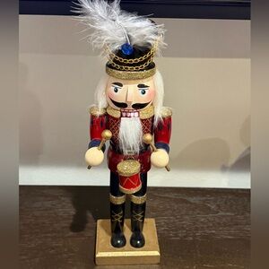 Festive Nutcracker with Red and Gold Accents